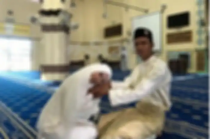 Zuraiha bersama suaminya yang bekerja sebagai sopir truk