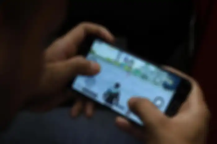 Ilustrasi kecanduan game online pada anak.