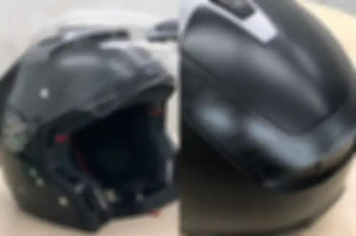 Helm Nolan N44 warna hitam doff diberi lapisan ceramic coating