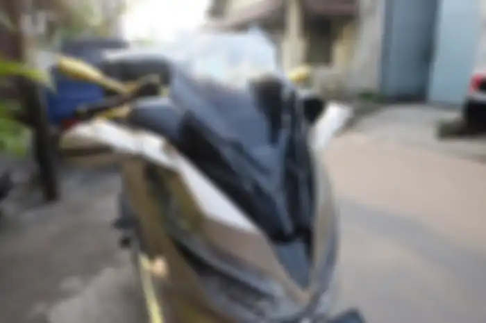 Enggak cuma buat NMAX, cover bodi bergaya XMAX juga tersedia untuk Honda PCX