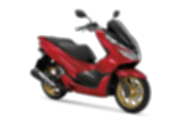 Honda PCX 150 Thailand warna merah hitam dan pelek emas.