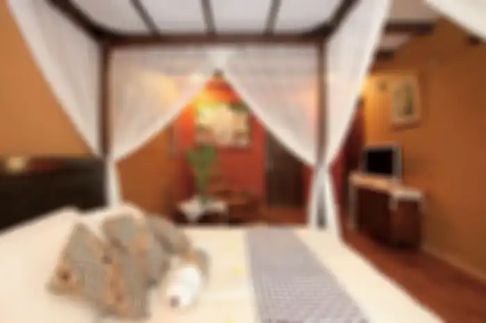 Kamar tidur didesain penuh kehangatan manjadi pilihan untuk rumah di lokasi dingin ini. 