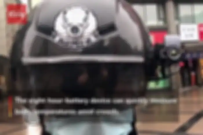 Helm pintar pendeteksi virus corona sudah dipakai anggota polisi di Tiongkok.