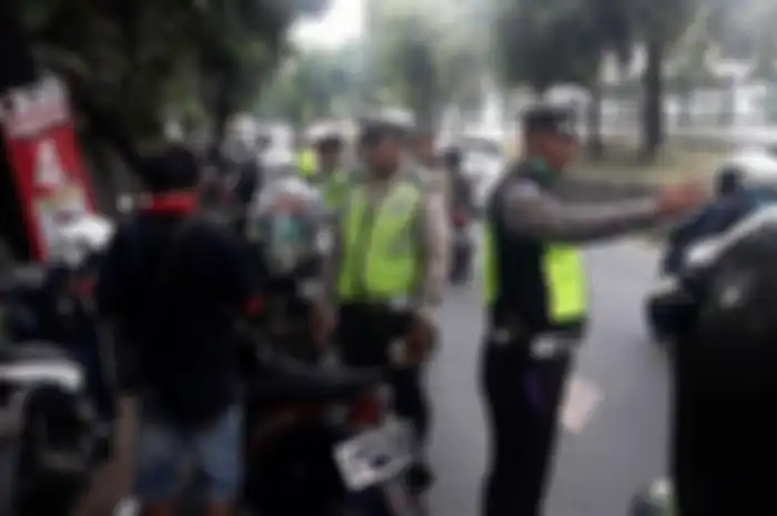 Ilustrasi razia polisi. kini ada pembebasan tilang dari polisi selama wabah corona.
