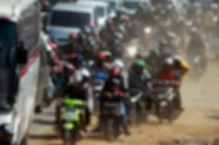 Ilustrasi mudik naik motor. Banyak yang Nekat, Petugas Memutarbalikkan 500 Pemotor yang Mau Mudik