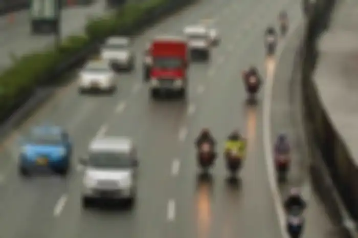 Ilustrasi motor masuk jalan tol.