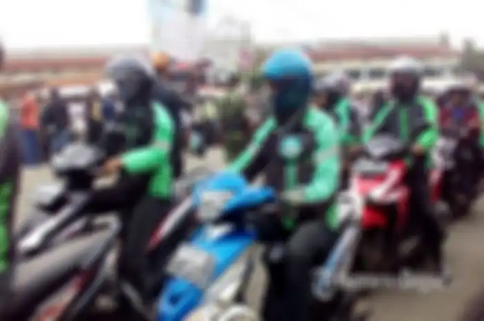 Ilustrasi driver ojol. Larangan ojol angkut penumpang masih berlaku selama masa PSBB Transisi.