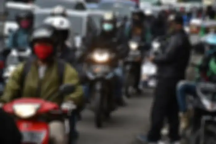 Ilustrasi pengendara motor. Pelanggar masa transisi menuju new normal 