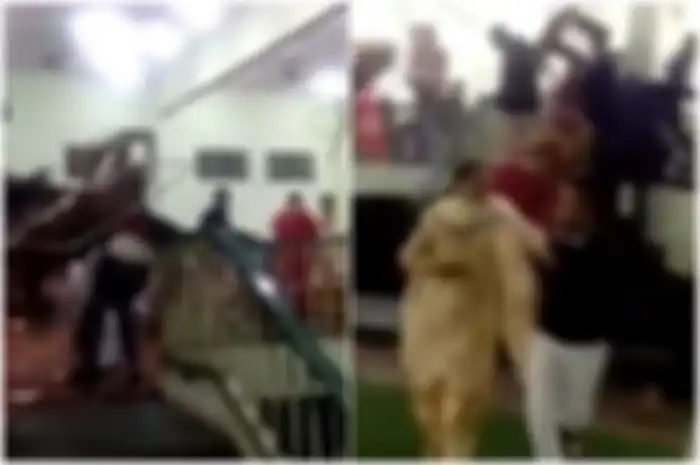 Pesta pernikahan berubah ricuh saat keluarga mempelai pria dan besan menggunakan meja sebagai senjata