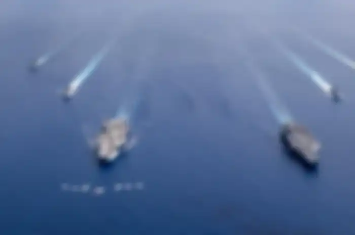 Ilustrasi kapal induk milik Angkatan Laut Amerika Serikat yang bersiap menuju Laut China Selatan.