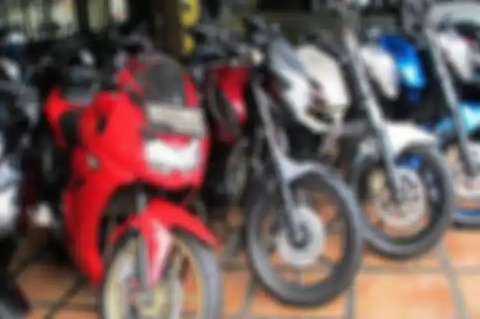 Ilustrasi dealer motor bekas tipe sport.