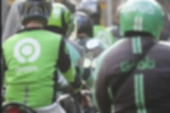 Serius? Dikabarkan Gojek dan Grab akan merger alias gabung, begini penjelasan pihak terkait.           