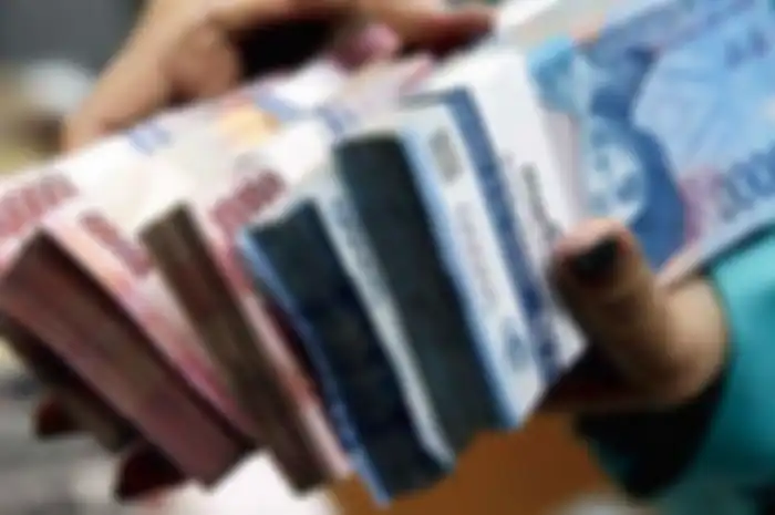 Ilustrasi uang. Cara daftar bantuan RP 3,55 juta pengganti BLT Rp 2,4 juta dari pemerintah, cepetan ambil KTP dan HP/