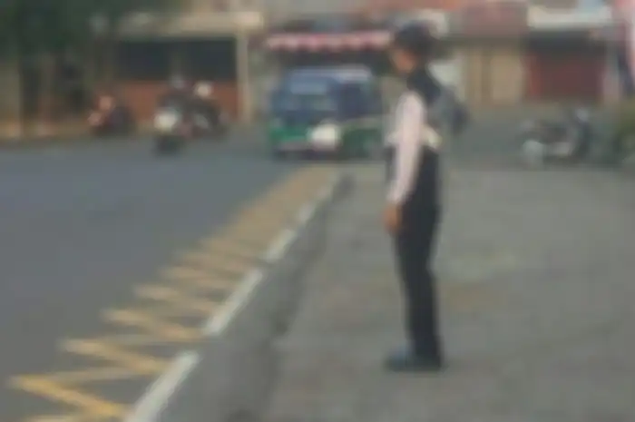 Fungsi dari marka jalan zig-zag