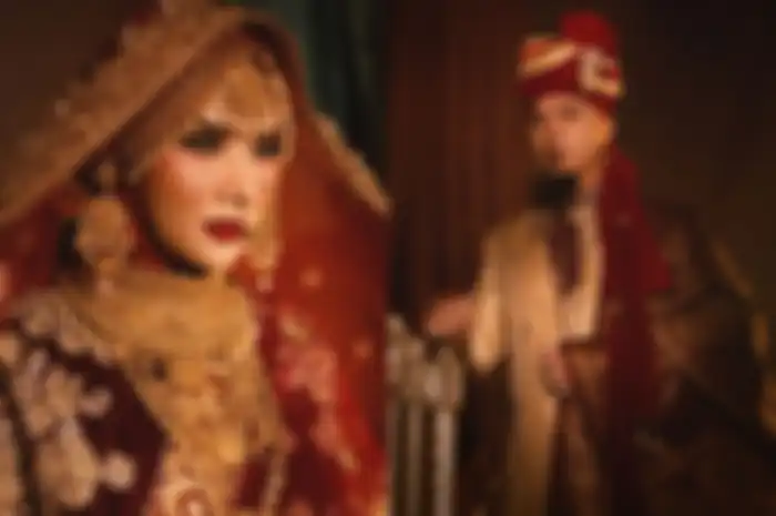 Penampilan Mulan Jameela dan Ahmad Dhani dalam balutan busana khas India