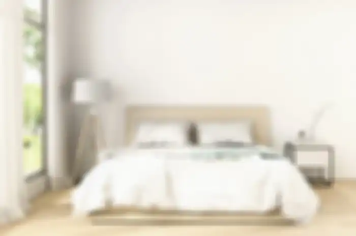 Ilustrasi kamar tidur simpel dengan bukaan yang cukup di rumah minimalis.