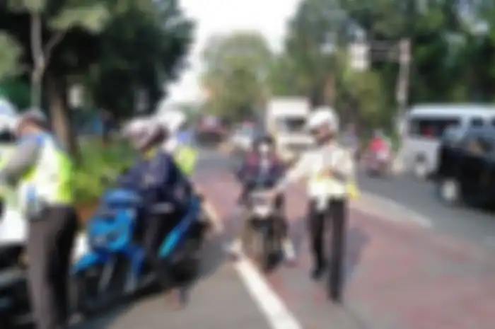 Ilustrasi tilang. Polisi Pastikan Gak Ada Sanksi Tilang Saat Operasi Lilin 2021, Ini Dia Gantinya