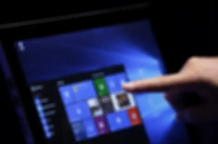 Ilustrasi laptop dengan OS Windows 10