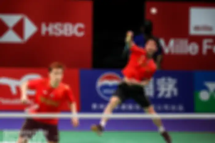 Aksi ganda putra Indonesia Marcus Fernaldi Gideon/Kevin Sanjaya Sukamuljo di perempat final Thomas Cup 2020.