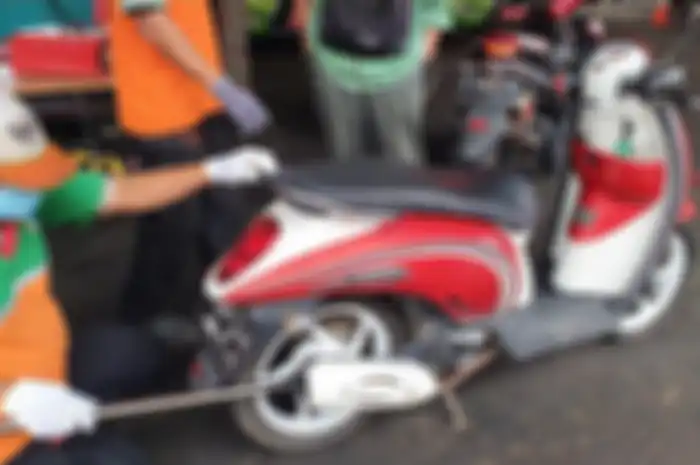 Ilustrasi uji emisi. Trik ampuh lulus uji emisi motor di DKI Jakarta, pemotor pasti aman dari tilang polisi.
