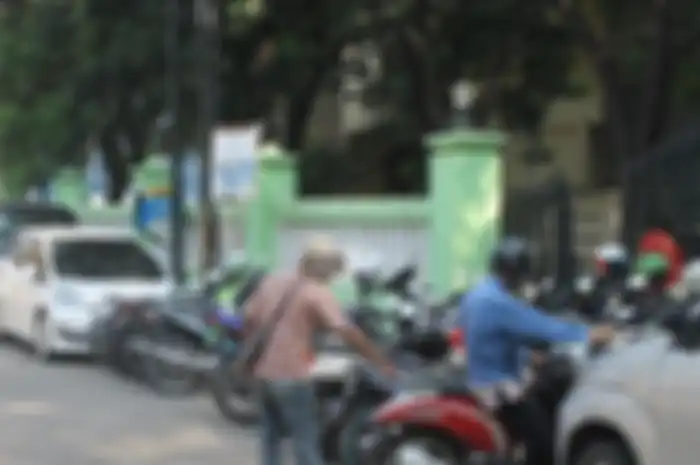 Tukang parkir liar bisa dipenjara 9 tahun kalau masih nekat minta uang padahal ada tulisan seperti ini. (Foto Ilustrasi)