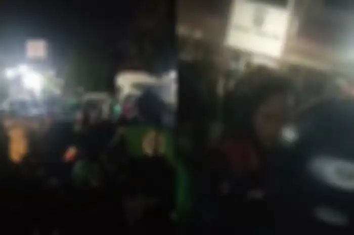 Ratusan driver ojol (ojek online) geruduk Polsek Pamulang diduga kesal ada rekannya yang dipukul oknum TNI pada Minggu (9/1/2022) malam.