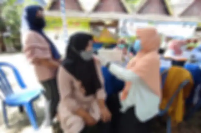 Seorang lansia bervaksin di kawasan Meseum Wasaka