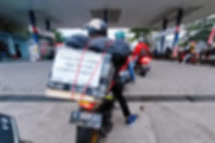 Salah satu contoh pemudik motor dengan tulisan unik.