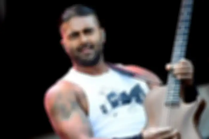 Guitarist of the Canadian SUM 41 rock band Dave Baksh performs on the main stage at the "Sziget" Island Festival in the Hajogyar (Shipyard) Island of Budapest on August 14, 2016 during an eight-day long 'Island Festival'.