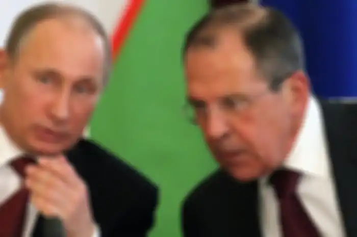 Presiden Rusia Vladimir Putin dan Menteri Luar Negeri Rusia Sergei Lavrov