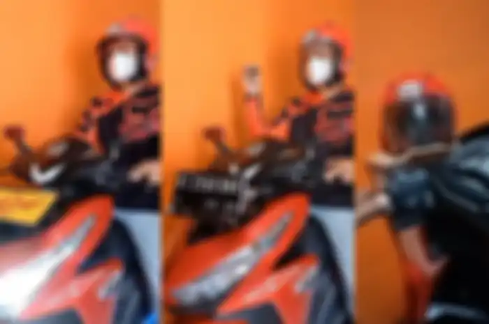 Motor Honda Vario 125 yang mempunyai mekanisme keren pada plat nomor dan helmnya