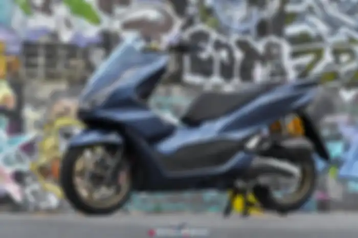 Modifikasi Honda PCX 160 bergaya simple dan proper, namun hedon dari atas hingga bawah.