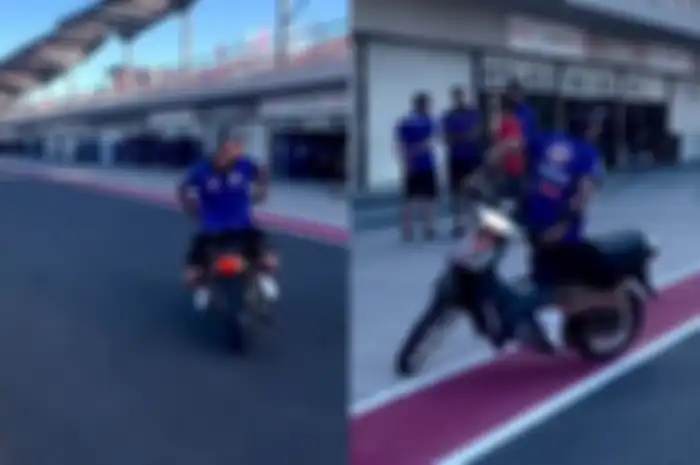 Pembalap WSBK Toprak Razgatlioglu (PATA Yamaha With BRIXX) naik motor sambil hadap belakang.