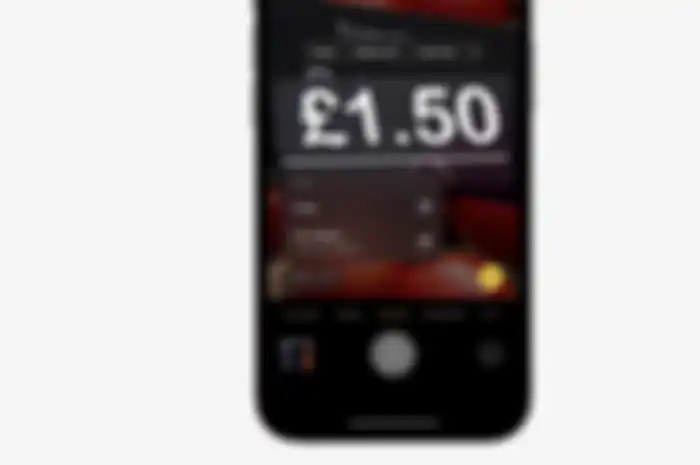 Ilustrasi fitur real-time currency di iOS 16