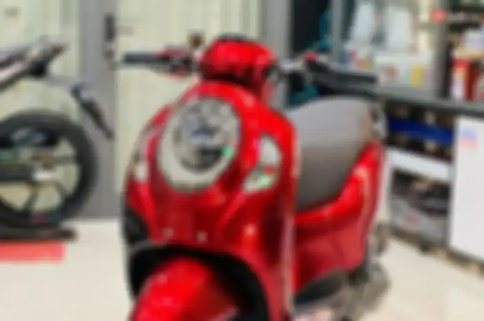 Ilustrasi. THR Ramadhan 2023 turun, modifikasi motor repaint cat bodi motor Honda Scoopy bisa dicoba. Bengkel spesialis kasih harga segini.
