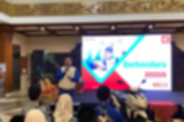 Siswa mendapat tips keselamatan berkendara oleh AHM di IMOS 2022