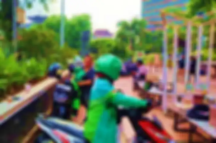 Ilustrasi driver ojol wanita di Semarang.