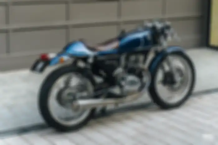 SYM Wolf 125 dirombak jadi motor custom gaya cafe racer elegan.