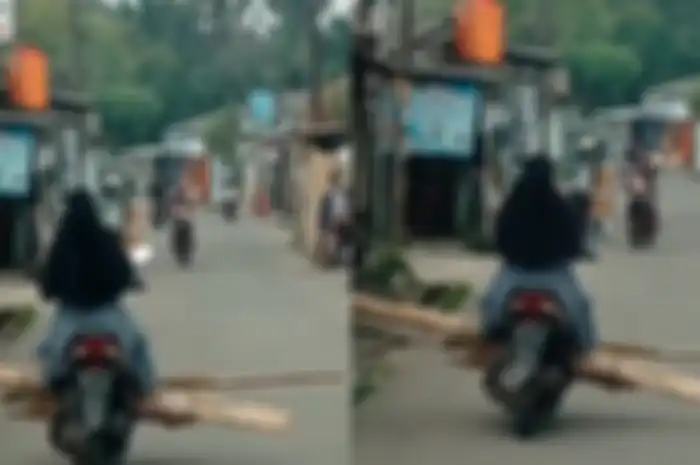 Momen emak-emak naik motor matic Honda Vario angkut kayu sampai pengendara lain panik.
