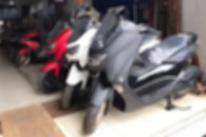 Ilustrasi motor matic Yamaha NMAX di diler. Harga motor naik 2023, motor matic Yamaha NMAX, Aerox, Lexi, dan Gear jadi segini.