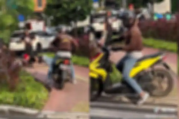 Aksi skateboarder halangi pemotor Honda BeAT yang nekat terobos jalur trotoar.
