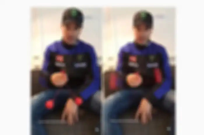 Aksi Franco Morbidelli saat bermain latto-latto.