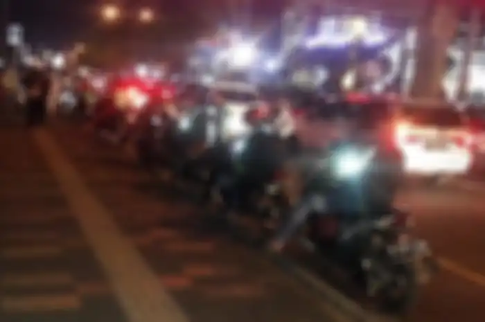 Ilustrasi driver ojol yang terkadang punya fungsi lain bagi pemotor.