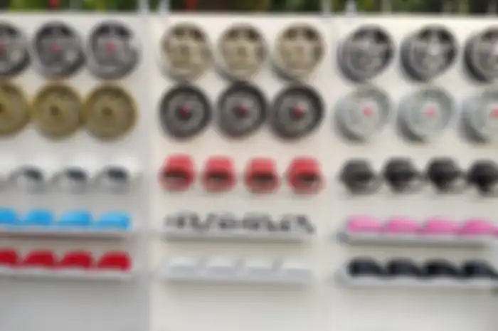 Spare part modifikasi motor untuk Vespa matic dari SOCA Wheels.
