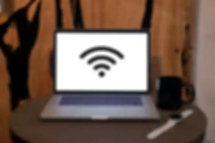 Ilustrasi fitur hotspot WiFi di laptop Windows.
