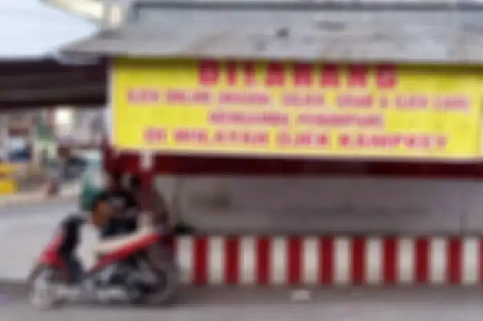 Pangkalan ojek di Jayapura dipenuhi spanduk tolak ojek online.