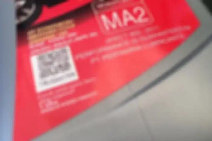 Cek oli palsu atau bukan lewat QR Code di botol.