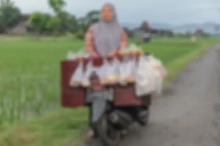 Penjual jamu naik Yamaha Mio diulas majalah Vogue