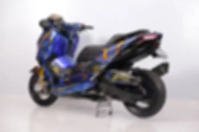 Foto ilustrasi modifikasi motor Yamaha XMAX. Yuk daftar CustoMAXI x Yard Built 2023, ada total hadiah ratusan juta rupiah.