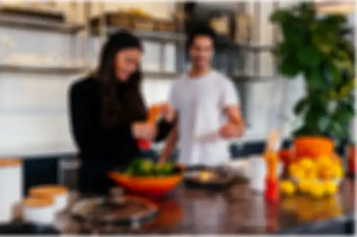 Ilustrasi zodiak yang cenderung menikmati memasak bersama pasangan.